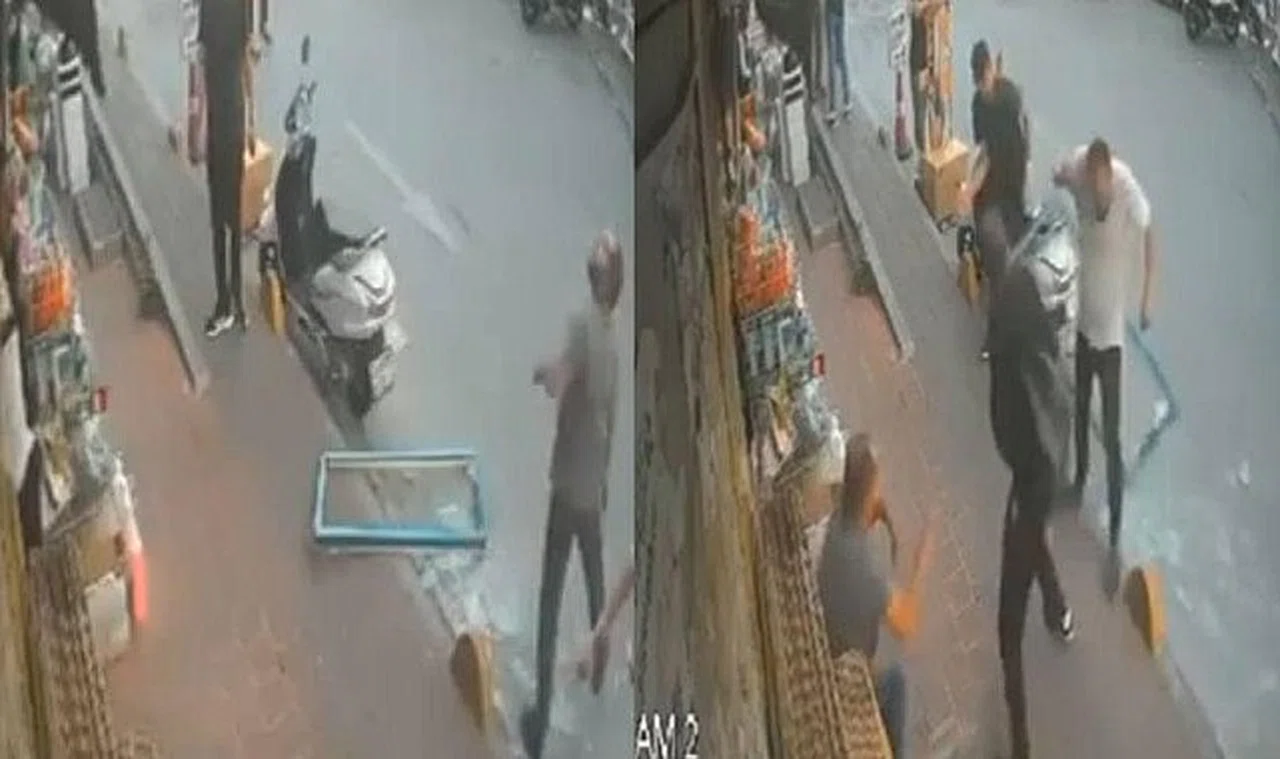 Her şey bir anda oldu! Kaldırımda otururken üzerine cam çerçeve düştü