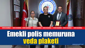 Emekli polis memuruna veda plaketi