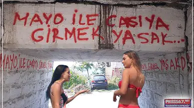 Tatil köyünde duvar yazılı karar; " Mayo ile çarşıya girmek yasak "