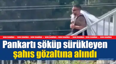 Pankartı söküp sürükleyen şahıs gözaltına alındı
