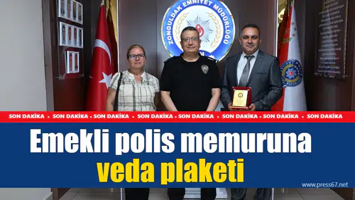 Emekli polis memuruna veda plaketi
