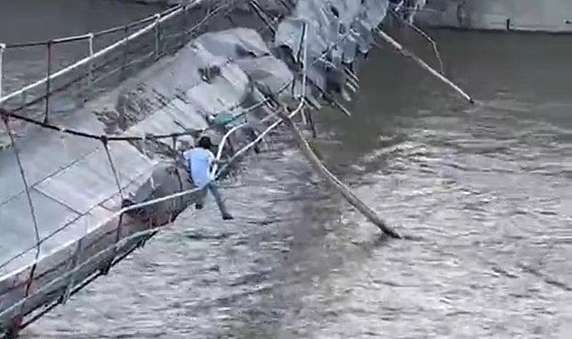 Yıkılma tehlikesi olan köprüye çıkarak canını hiçe saydı