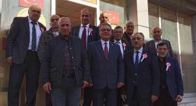Muhittin Dikmen'den muhtarlara anlamlı ziyaret