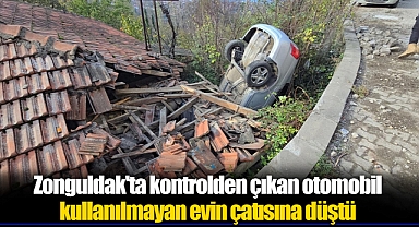 Zonguldak'ta kontrolden çıkan otomobil kullanılmayan evin çatısına düştü